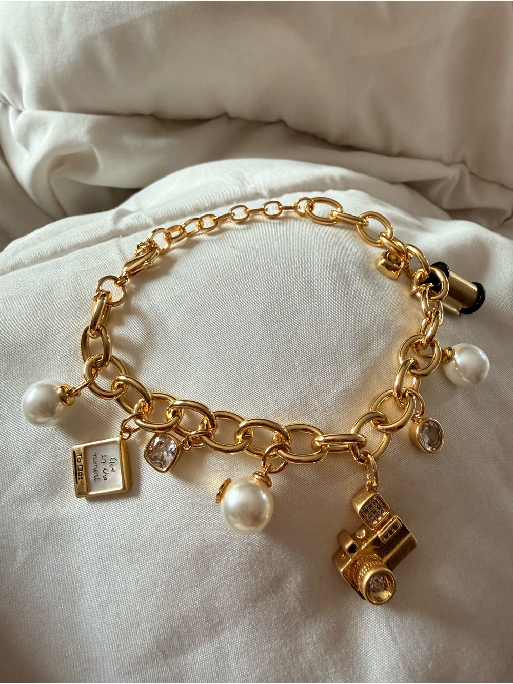 The Kate Spade Picture Perfect Camera 12K Gold Plated Brass CZ Charm Bracelet